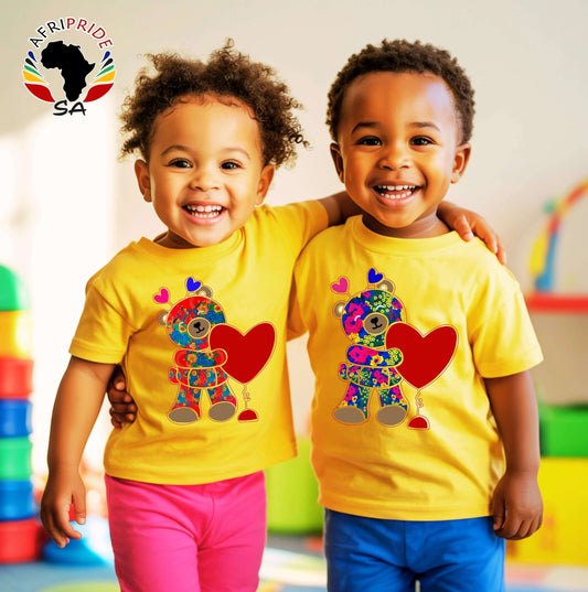 Unisex kids yellow T-shirts with colorful African fabric teddy bear and red heart design, made from 100% cotton for comfort and style.