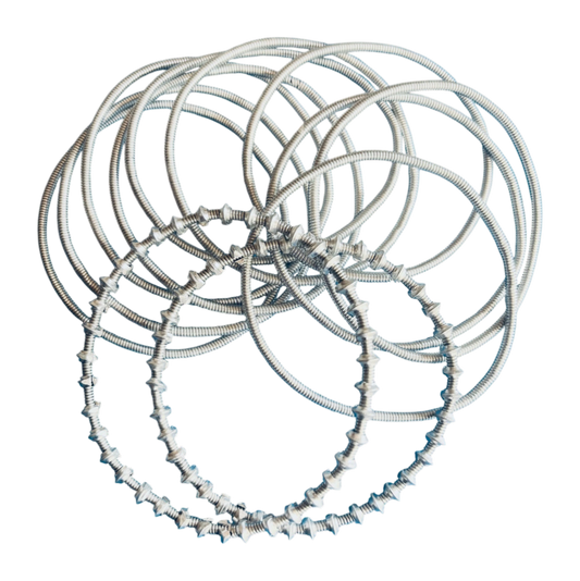 Set of Mixed Venda Bangles/Bracelets on a white background