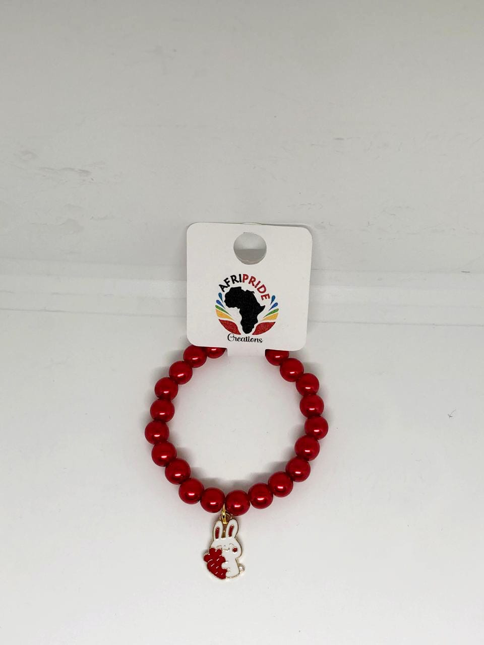 Kids & Teens Bracelet with a charm - Red